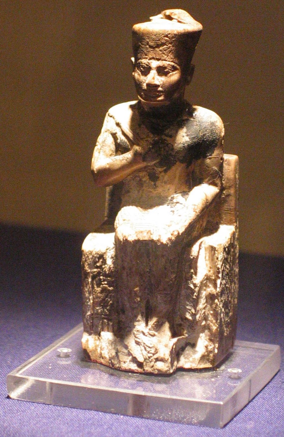 Detail of the face of an statuette of Khufu from the Egyptian Museum, Cairo